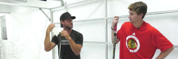 Hockey trainer working with teen in a RapidShot